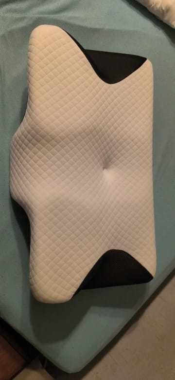 Customer photo review of Almohada cervical ergonómica