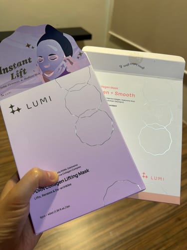 Customer holding the purple PDRN Collagen Lifting Mask box, with a second box visible behind it.
