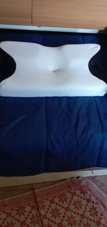 Customer photo review of Almohada cervical ergonómica