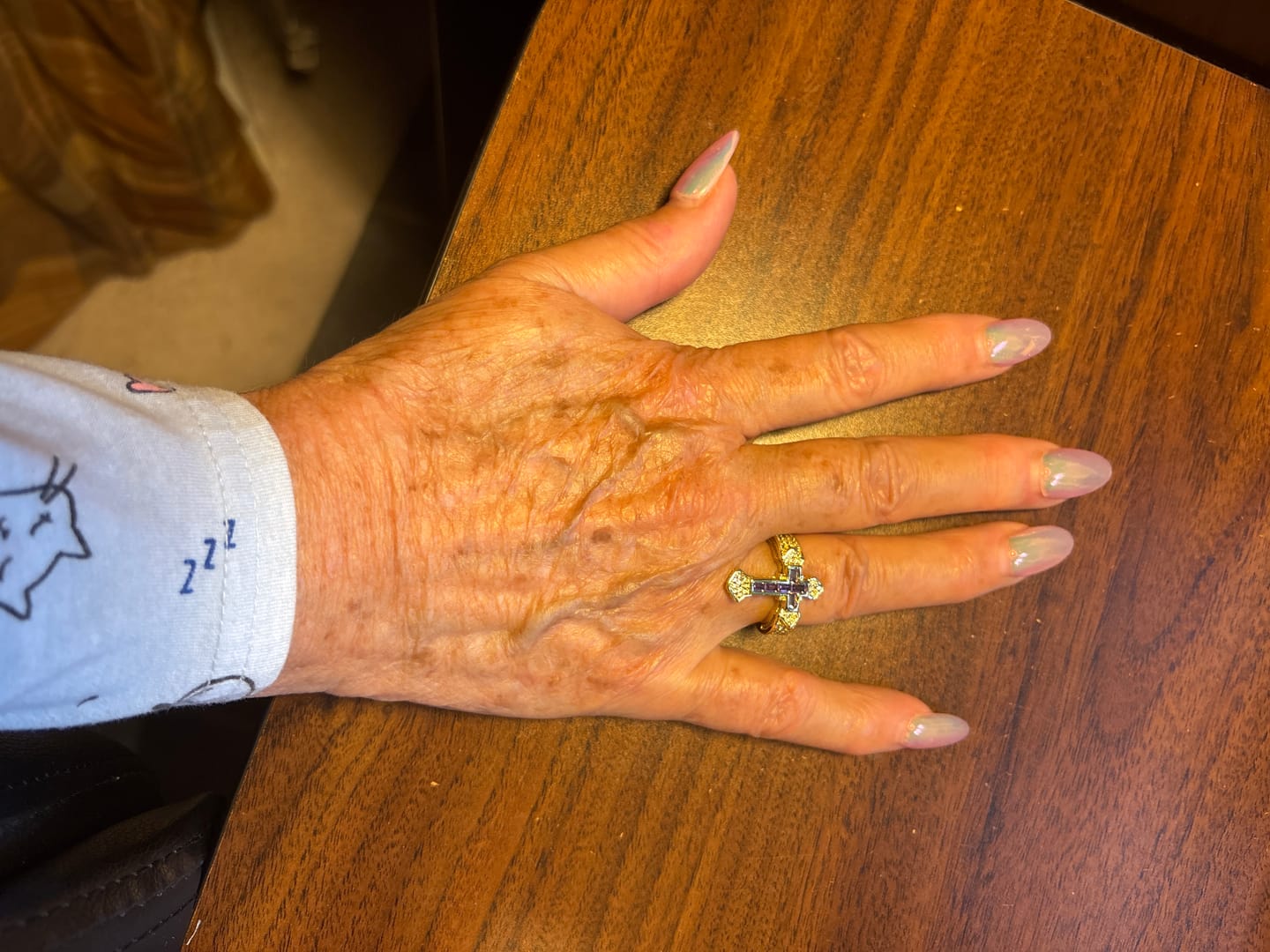 Customer photo review of Christianartworkshop Central Cross Motif Ring with Cubic Zirconia Accents: Carry His Care in Daily Wear