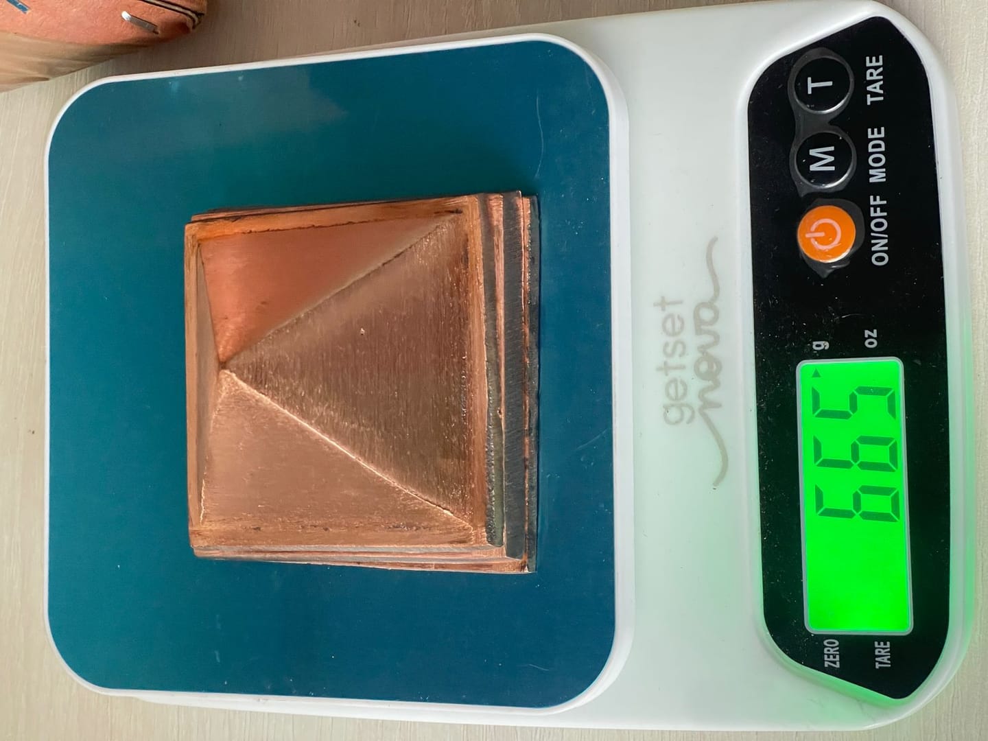Customer photo review of 3-Layer Copper Pyramid Vastu Remedy for Energy Amplification, Prosperity and South East Direction Activation for Home, Office and Vastu Correction | 5-7.6 cm | 665 g
