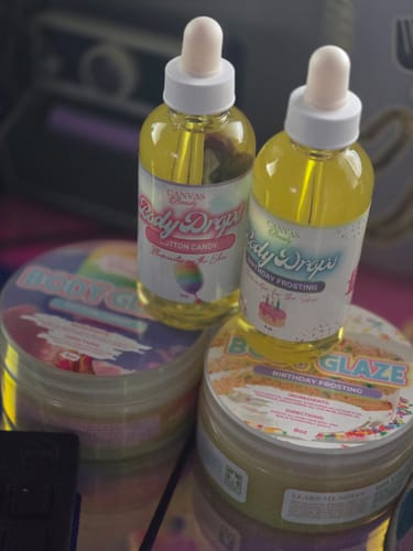 Customer's Cotton Candy Body Glaze jar and Body Drops bottle shown with other scented products.