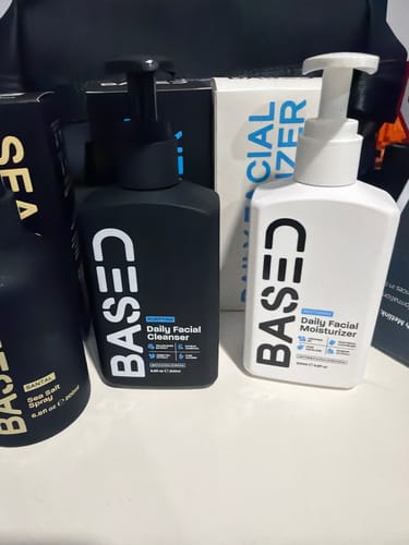 Customer's Daily Skincare Duo, featuring the black Daily Facial Cleanser and white Daily Facial Moisturizer bottles.
