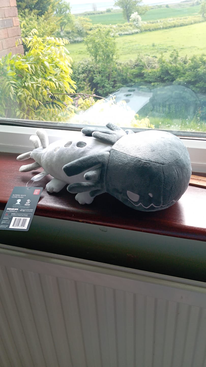 Customer photo review of Rain World - Glowing White Lizard Plush