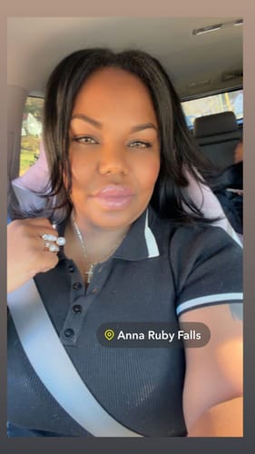 A close-up selfie of a reviewer wearing the DIAMOND Brown Shadow Colored Contact Lenses.