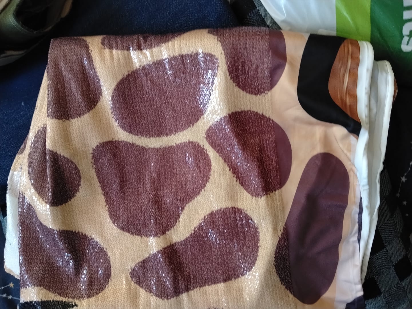 Customer photo review of Animal Print Sequin Fabric by the Metre
