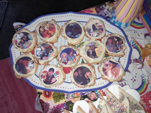 Customer's platter of cookies, each decorated with a different round edible icing image from the set.