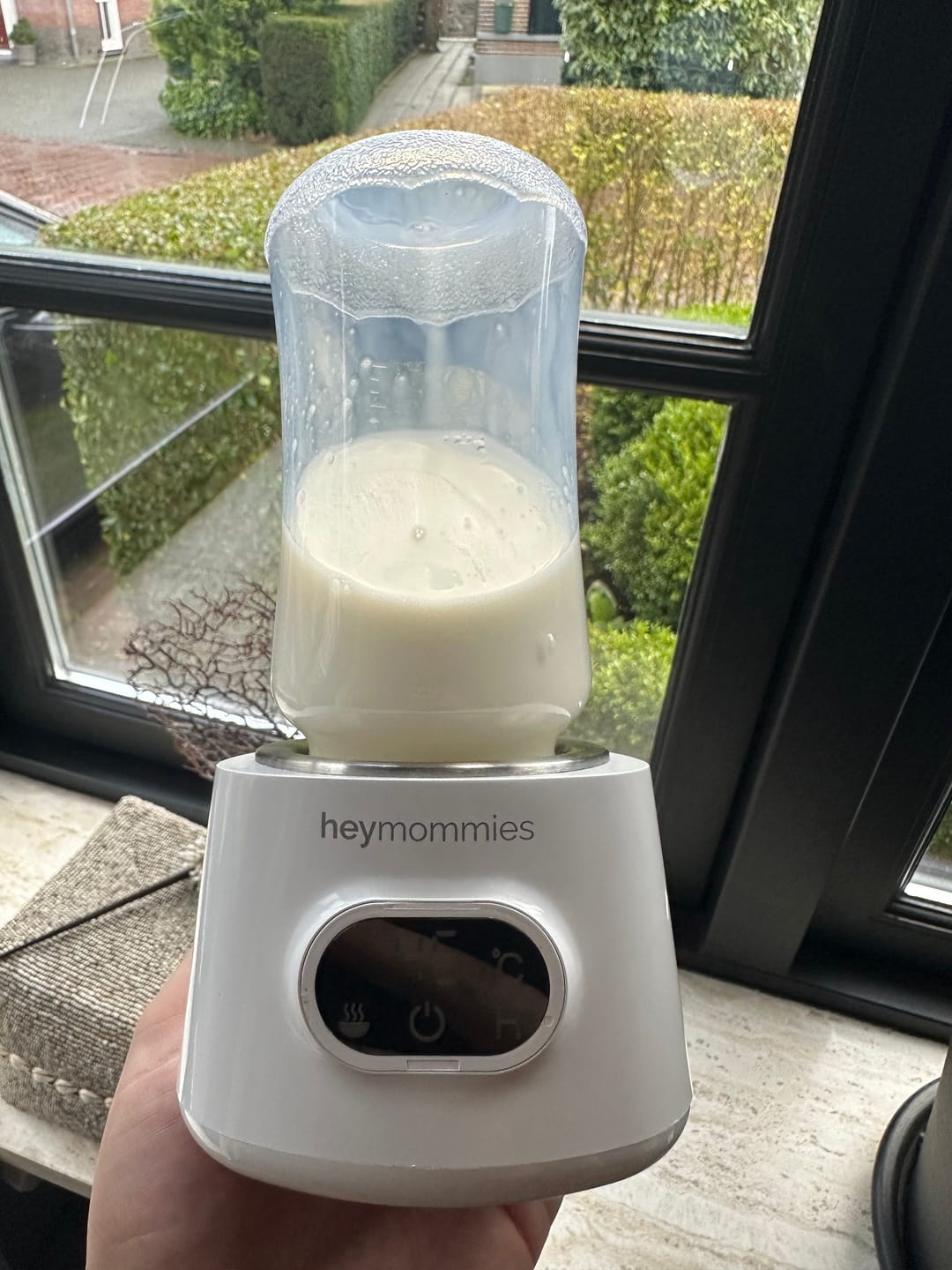 Customer photo review of Draagbare Flessenwarmer - Heymommies Warm Plus