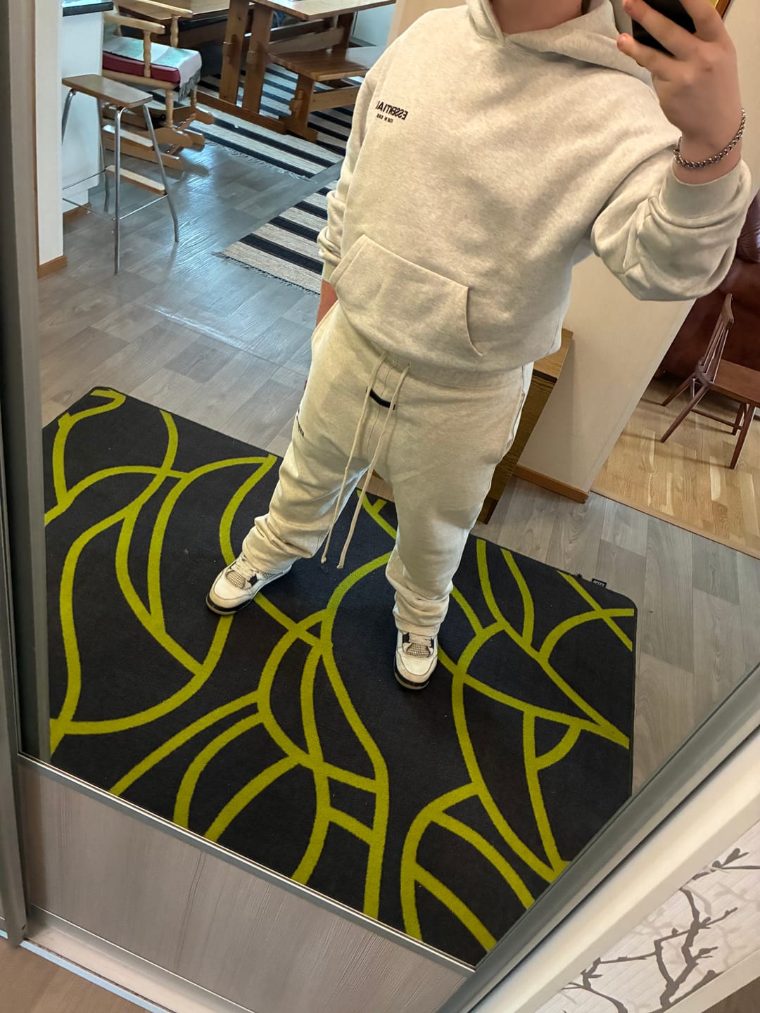 Customer photo review of Fear of God Essentials Sweatpants Light Oatmeal Relaxed (Flared)