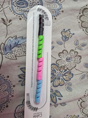 Customer's multi-colored spiral Cable Protector in its retail packaging.