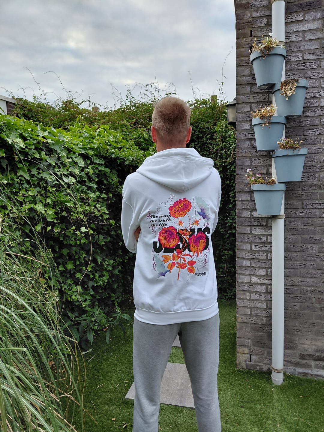 Customer photo review of Jesus Flower Zipper Hoodie Backprint
