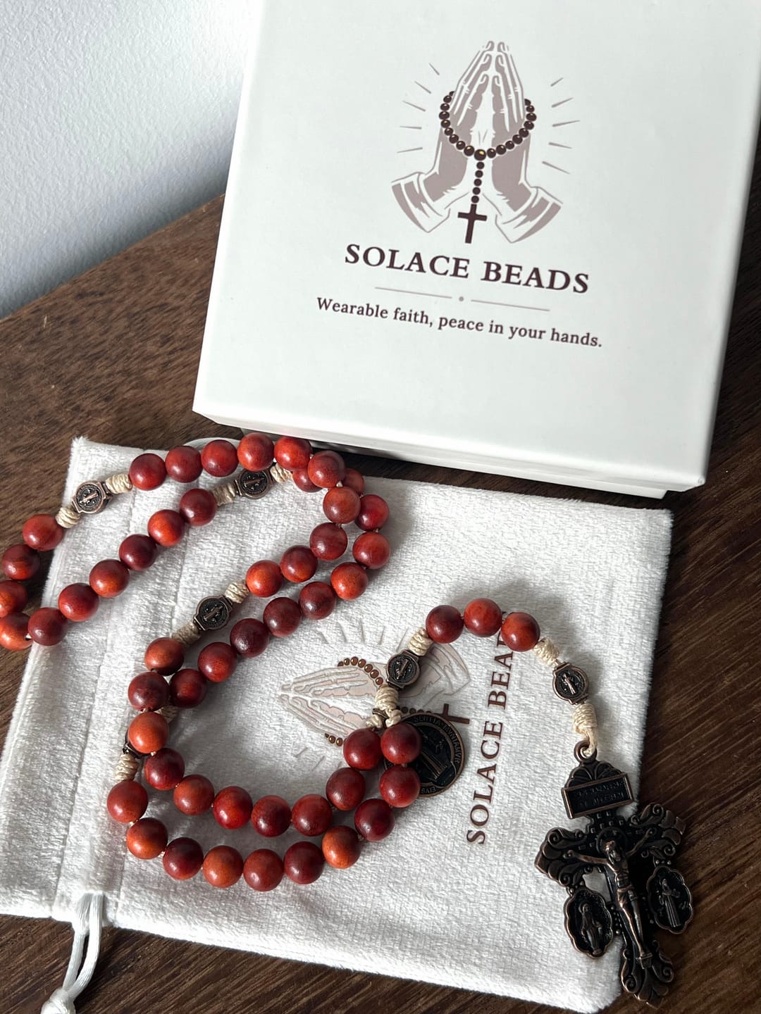 Customer photo review of SolaceBeads Dragon Blood Wood Beads St. Benedict Protection Shield Rosary