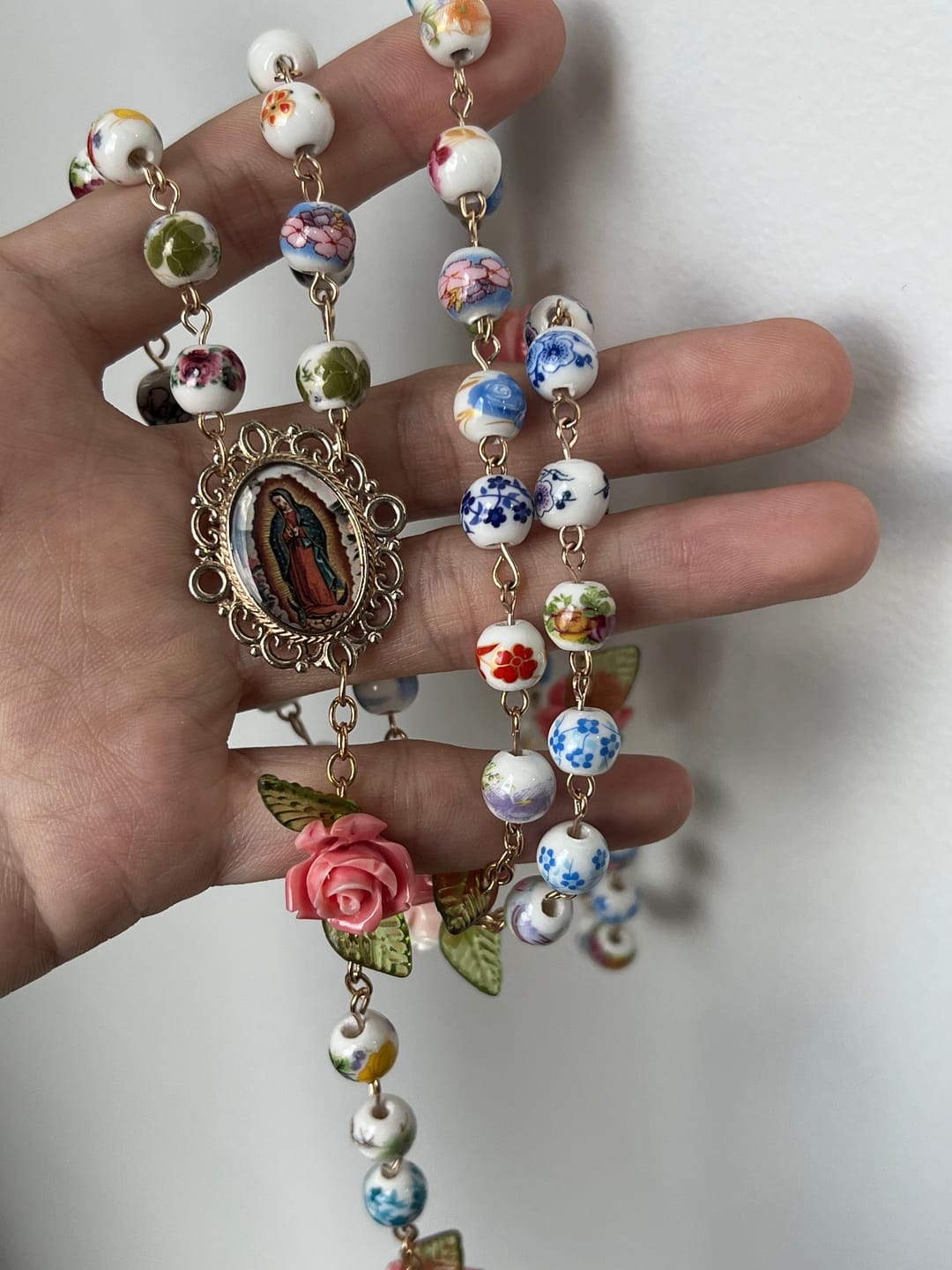 Customer photo review of SolaceBeads Vintage Mixed Floral Ceramic Rosary With Guadalupe & Crucifix: Timeless Garden