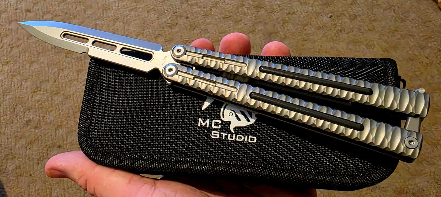Customer photo review of Maxace Obsidian Balisong Titanium Integrated Handle Bailu M390 Blade Integrated Structure Bushing