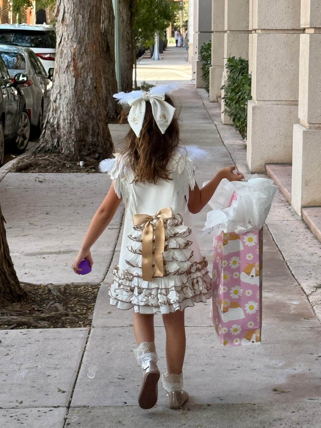 Customer photo review of Angelina White Feather Wings Dress