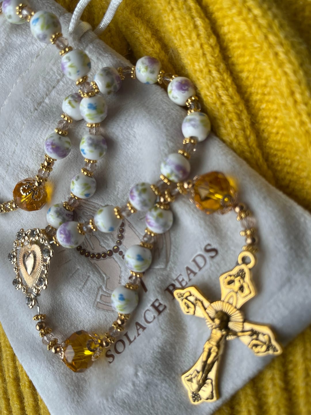 Customer photo review of SolaceBeads Lavender Floral With Golden Sacred Heart & Crucifix Rosary: Faith in Every Bead