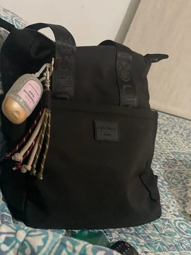Reseña con foto de un cliente sobre Mochila Llavero Street