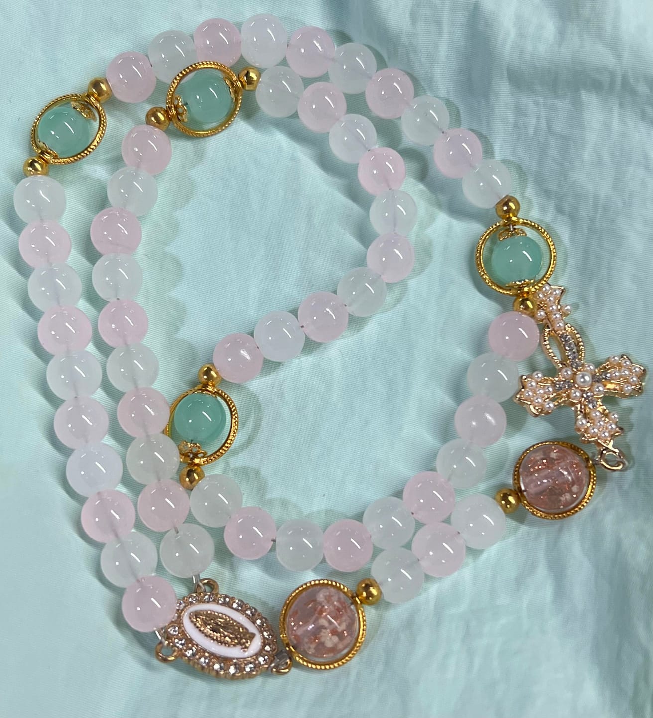 Customer photo review of SolaceBeads Artistic Pink & White Beaded Rosary: A Fusion of Colors & Sacred Symbols
