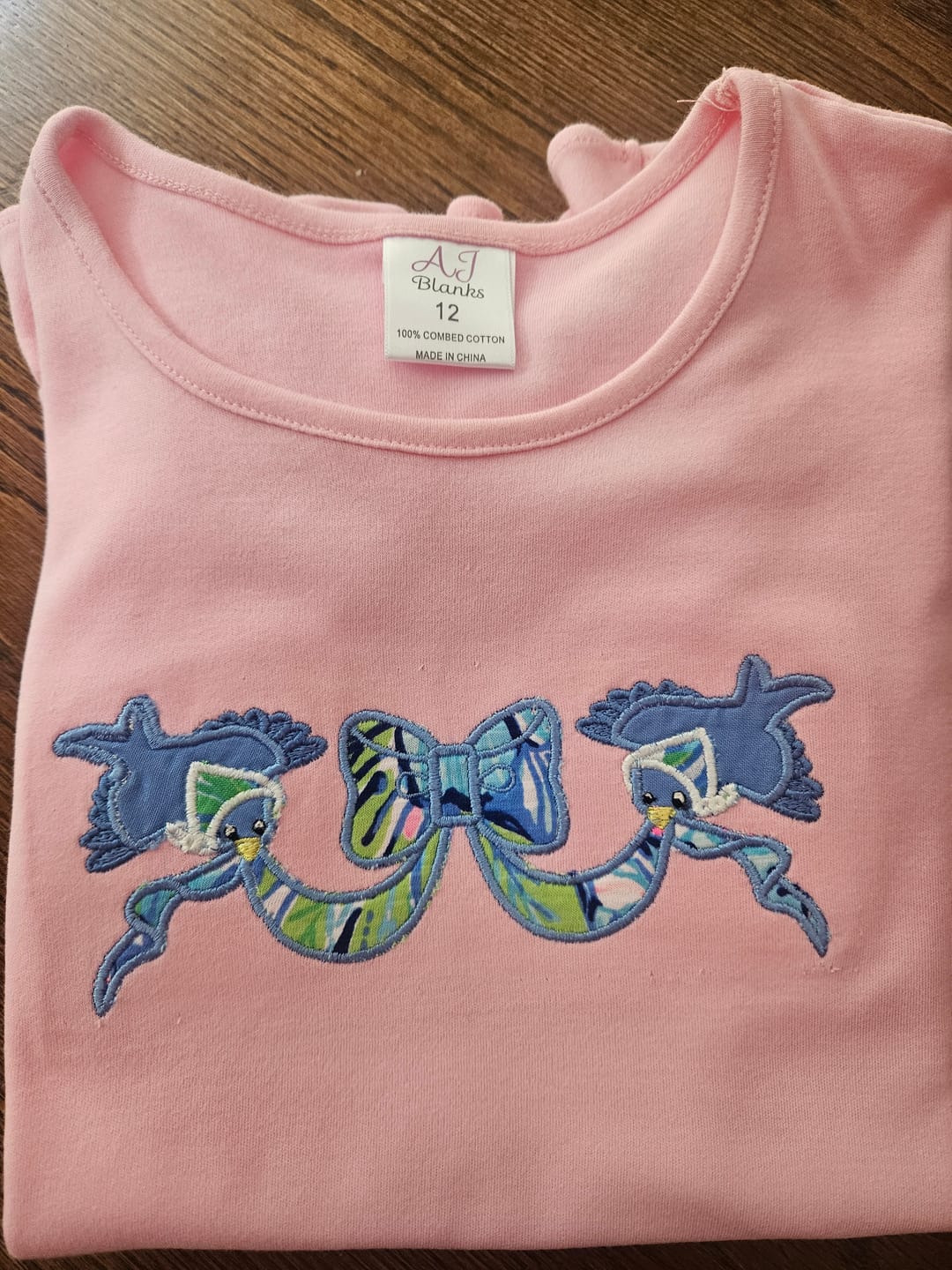 Customer photo review of Girl's Short Sleeve RUFFLE BOTTOM Shirts