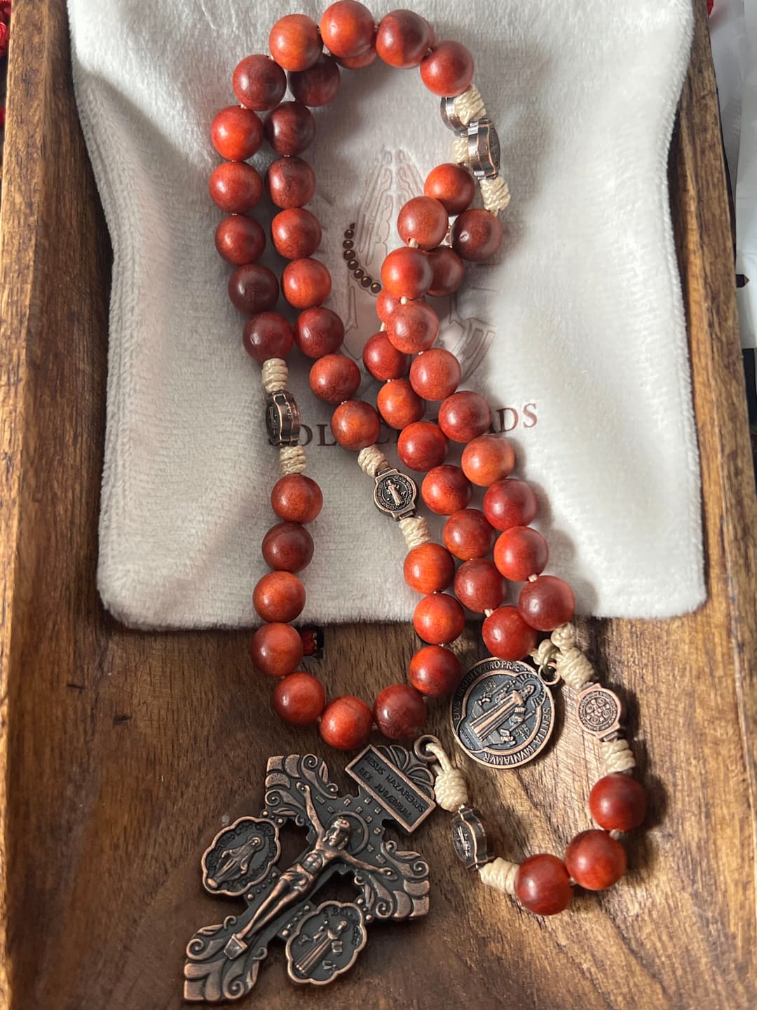 Customer photo review of SolaceBeads Dragon Blood Wood Beads St. Benedict Protection Shield Rosary