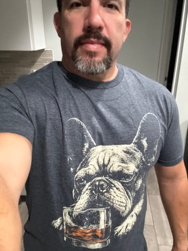 Customer wearing the dark grey Whiskey Frenchie Grunge T-Shirt with a clear view of the bulldog graphic.