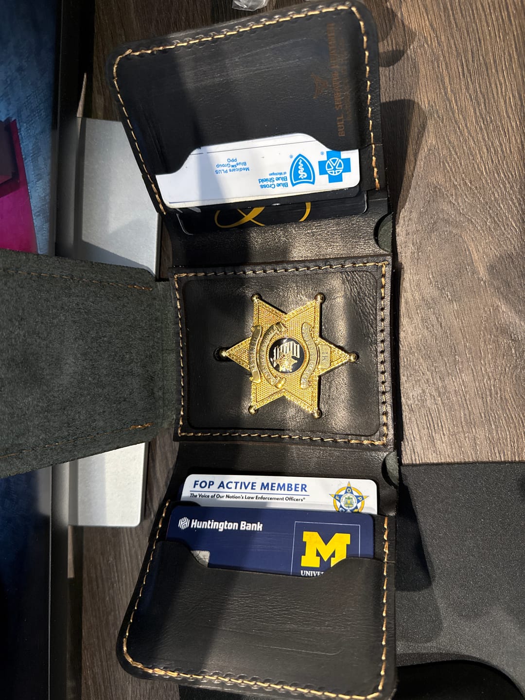Customer photo review of Badge Trifold Wallet