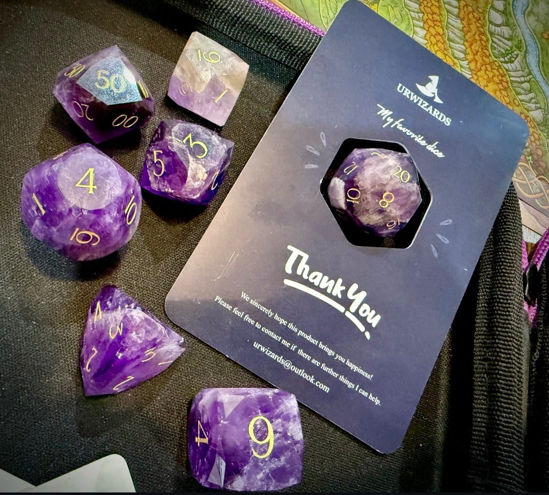 Customer photo review of URWizards D&D Multi-faceted Gemstone Engraved Dice Set