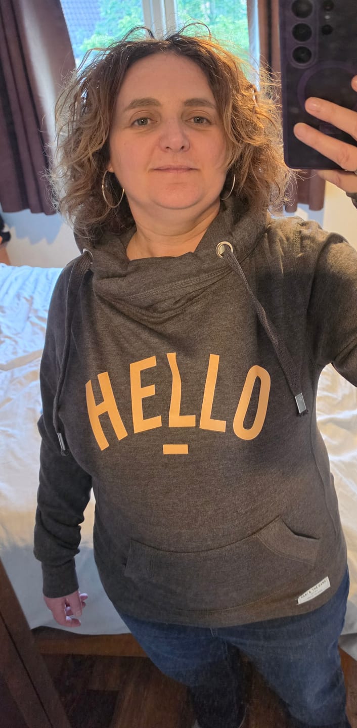 Customer photo review of Orange Hello hoodie in Charcoal