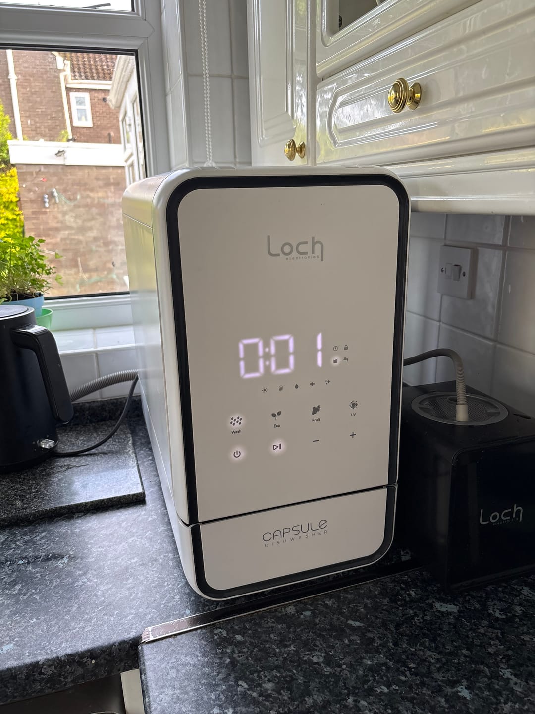 Customer photo review of Capsule Dishwasher