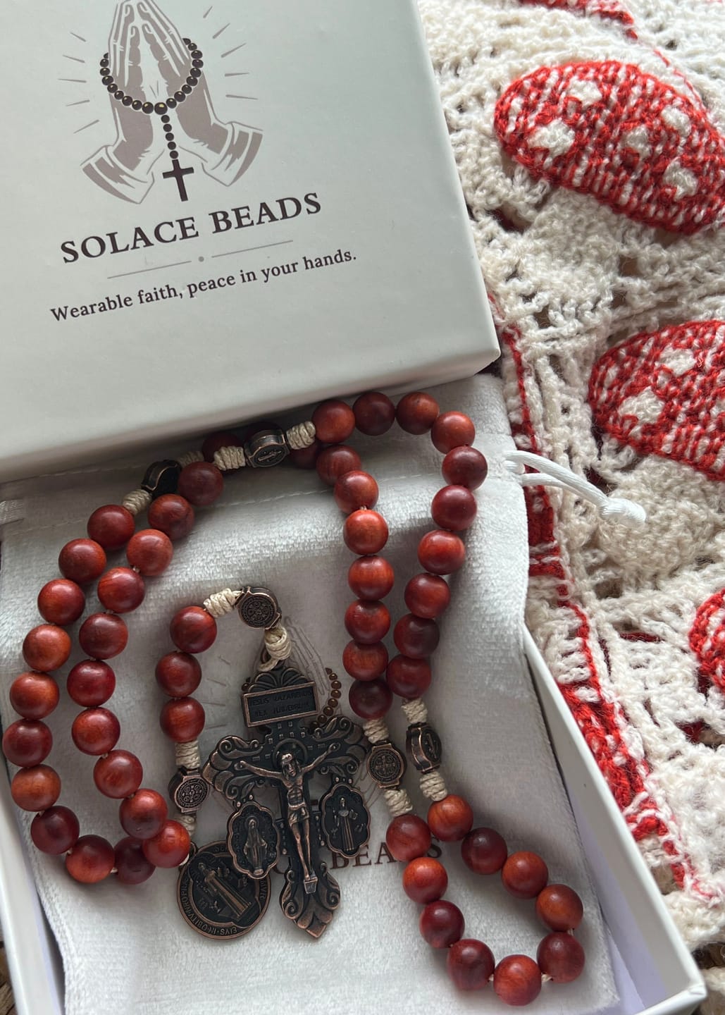 Customer photo review of SolaceBeads Dragon Blood Wood Beads St. Benedict Protection Shield Rosary