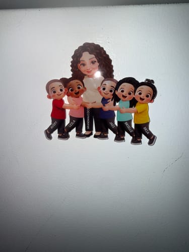 Customer's personalized acrylic magnet showing a grandma character hugging five grandchildren.