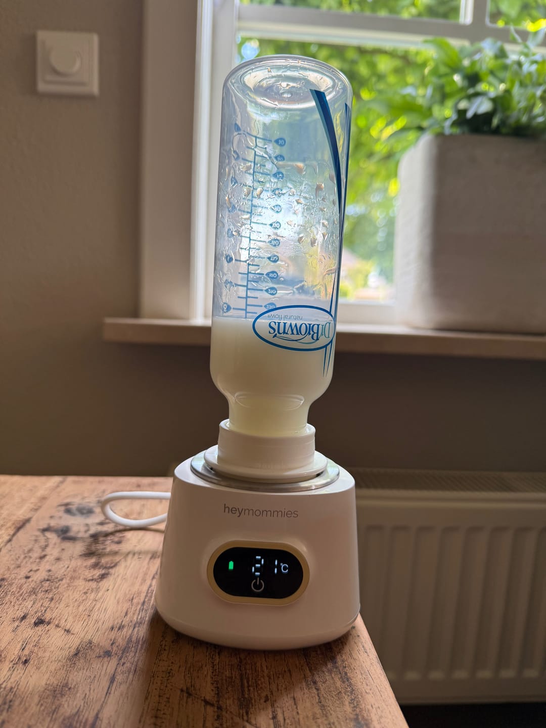 Customer photo review of Draagbare Flessenwarmer - Heymommies Warm Plus