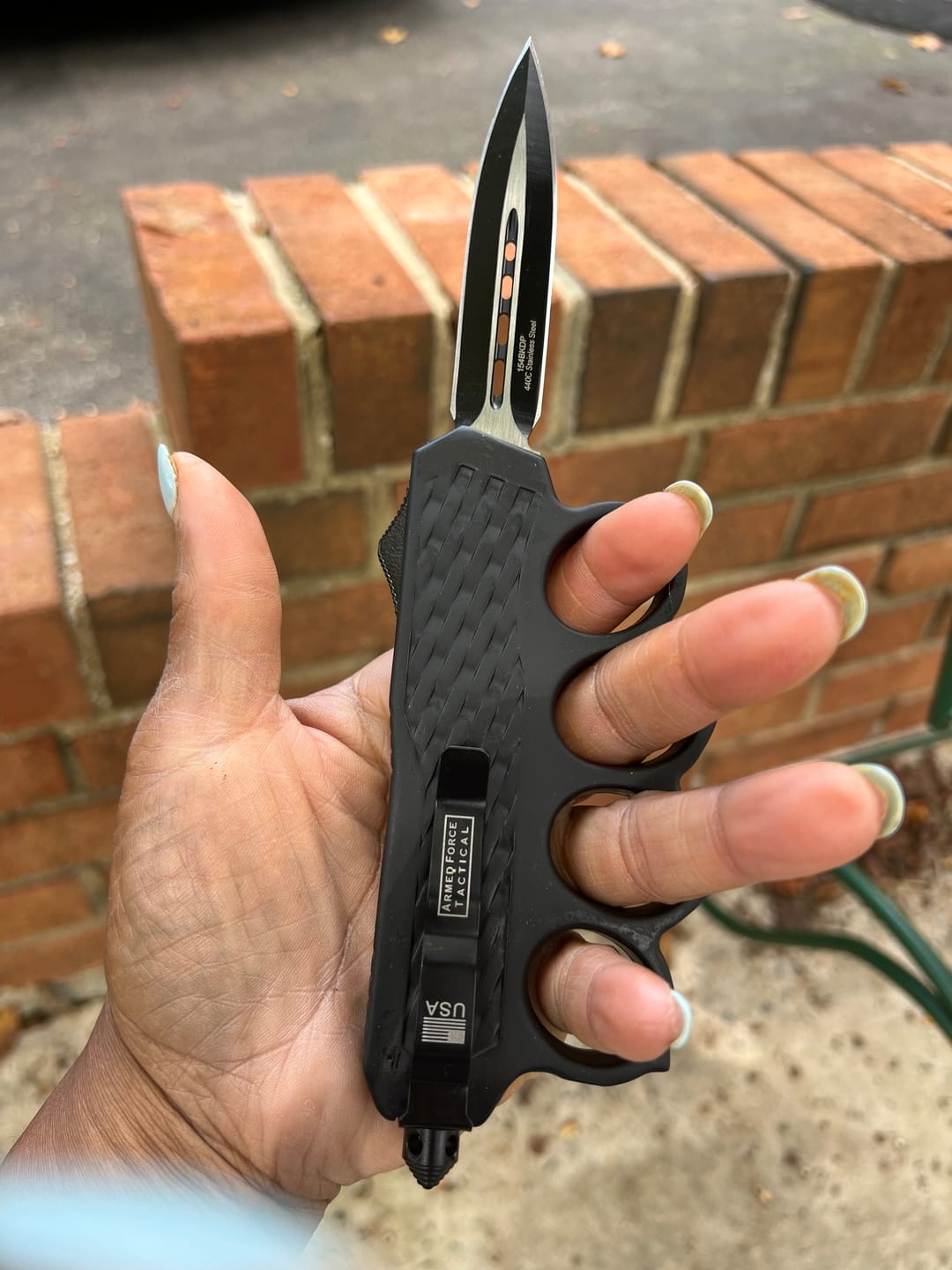 Customer photo review of Tactical Knuckle OTF Knife