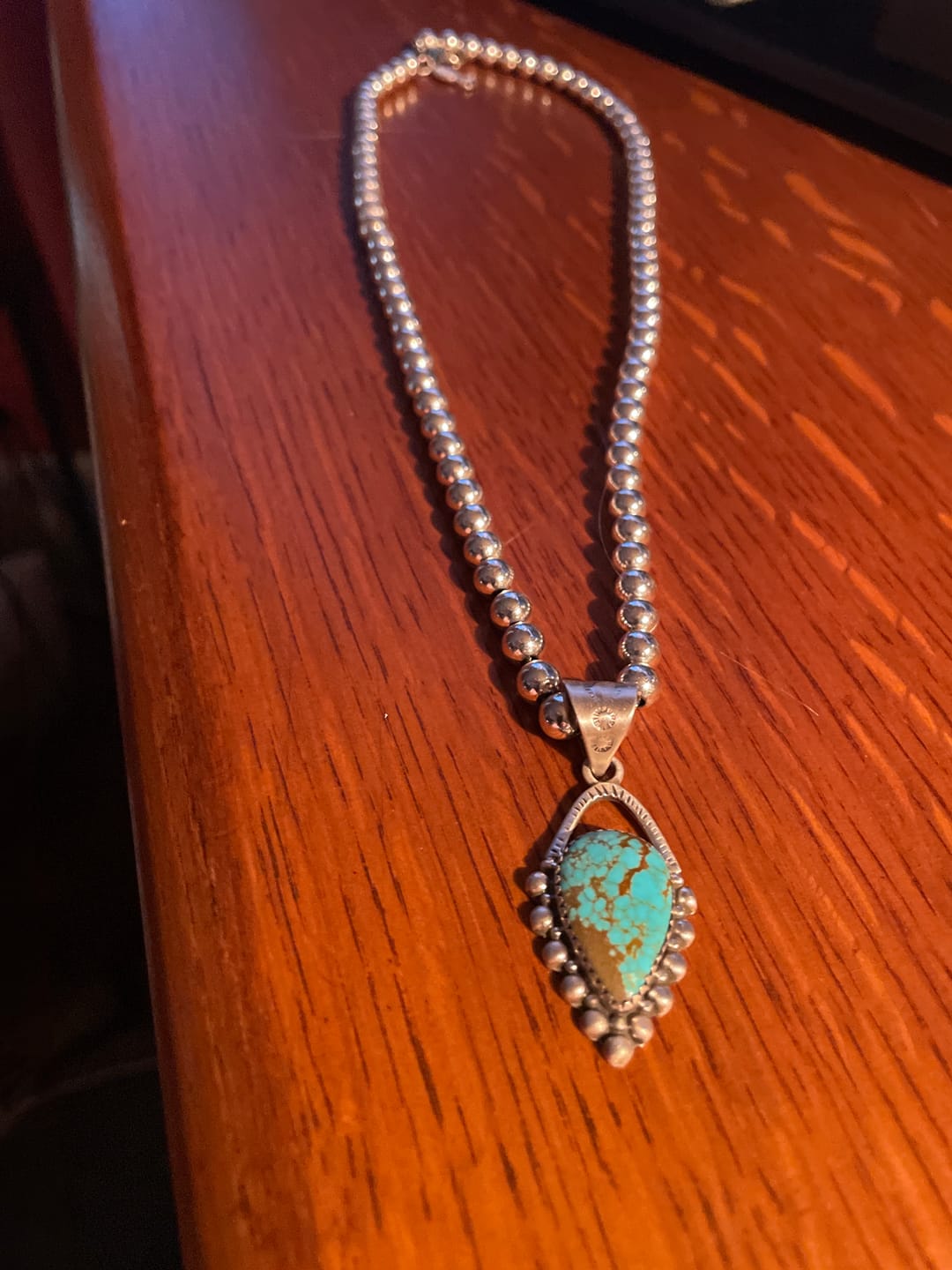 Customer photo review of Handmade Sterling Silver Number 8 Turquoise Pendant "Signed Nizhoni"