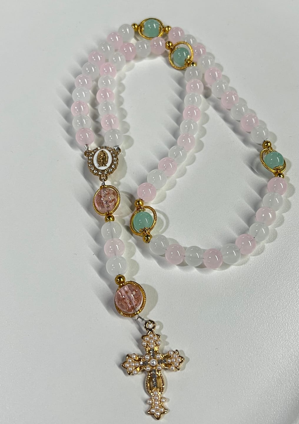Customer photo review of SolaceBeads Artistic Pink & White Beaded Rosary: A Fusion of Colors & Sacred Symbols