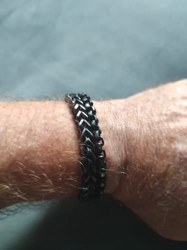Customer wearing the dark Round Box + Franco Link Bracelet on their wrist.