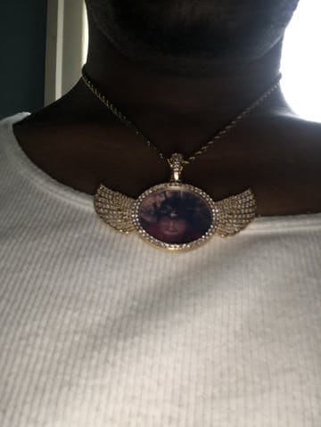 Customer photo review of Angel Wing Photo Necklace With Picture Inside – Custom Personalized Pendant