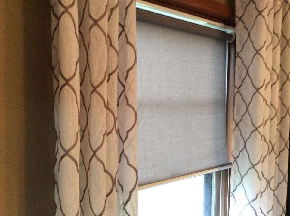 Customer photo review of Smart Motorized Light Filtering Roller Shades 70% Blackout Linen Translucent