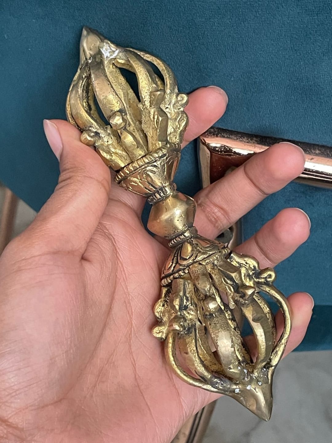 Customer photo review of Brass Vajra Dorje Ritual Tool Vastu Remedy for Protection, Tibetan Meditation and Home Temple Energy 15.7 x 4 cm | 340 gm