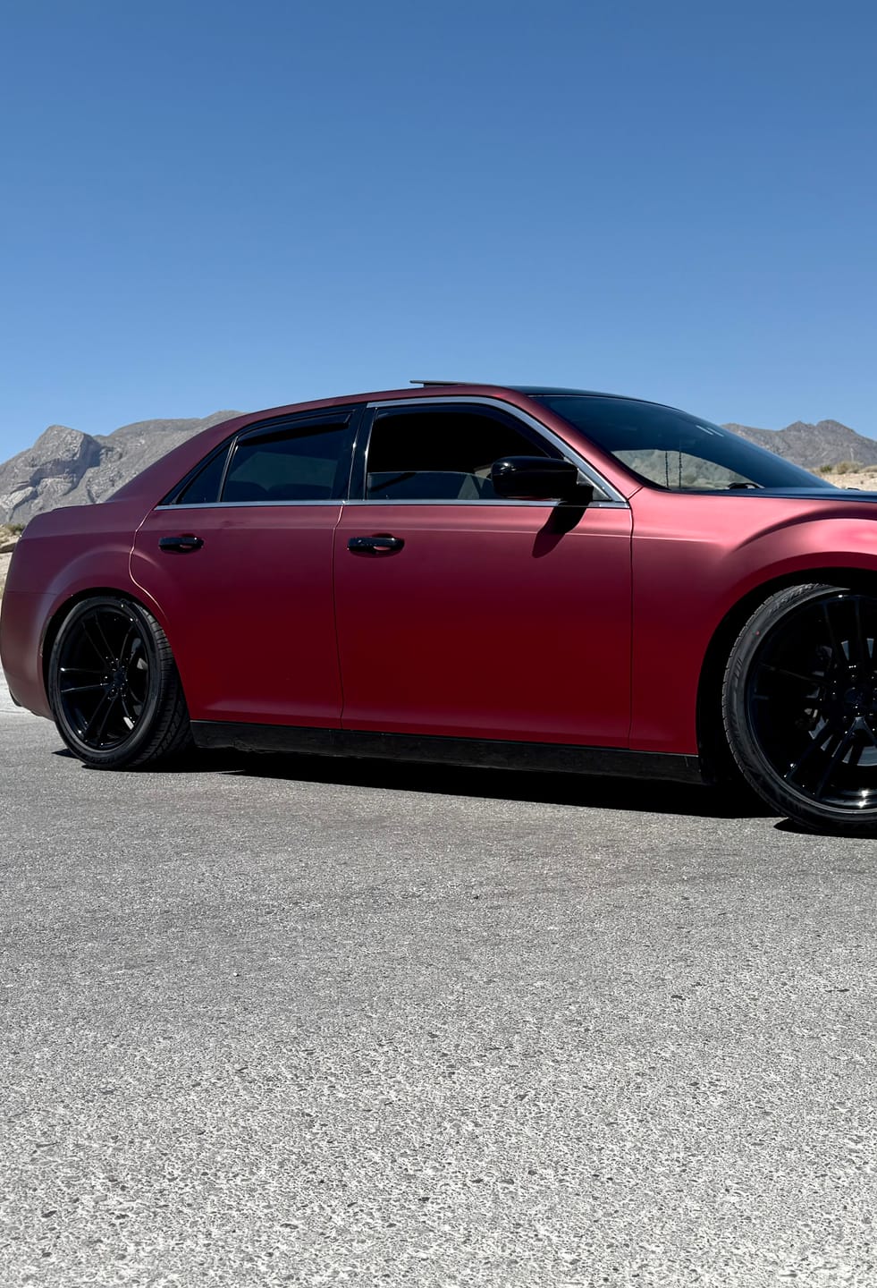 Customer photo review of Satin Chrome Silk Oxide Red Vinyl Wrap