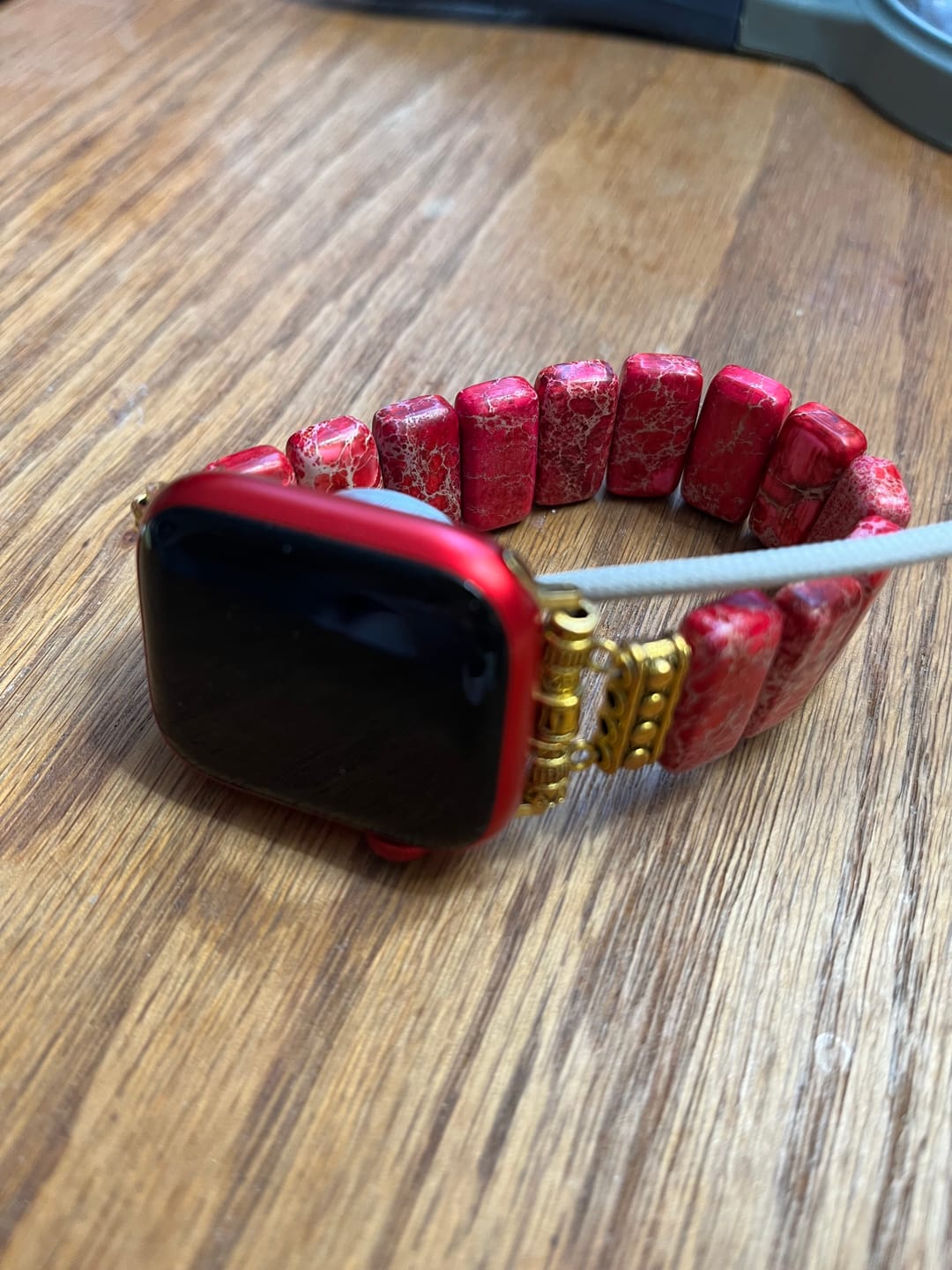 Customer photo review of Scarlet Tibetan Jasper Stretch Apple Watch Strap
