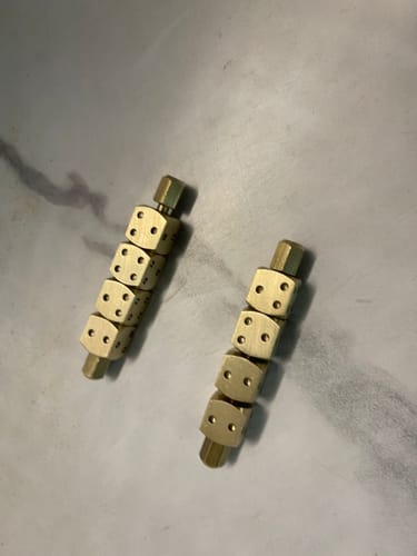 Customer photo review of Brass Ramal Pass Dice – Vastu Remedy for Divination & Spiritual Consulting | Ideal for Astrology Readings & Vastu Analysis | 8 cm x 1.4 cm x 1.4 cm | 200 g