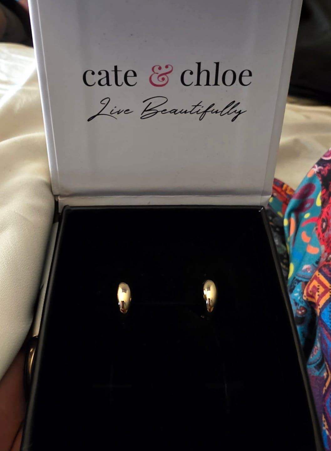 Customer photo review of Emersyn 18k White Gold Plated 14mm Hoop Earrings for Women