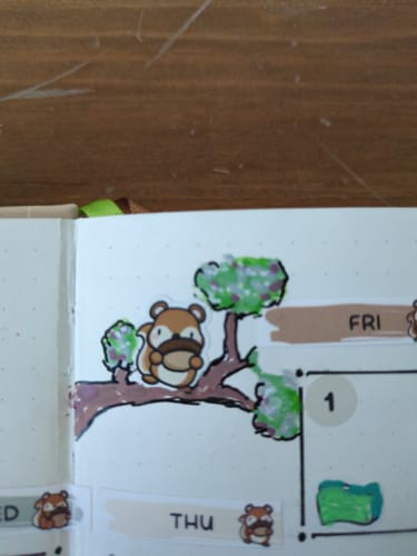 Customer's Squirrelly Acorn Planner Sticker used as a cute accent on a hand-drawn tree.