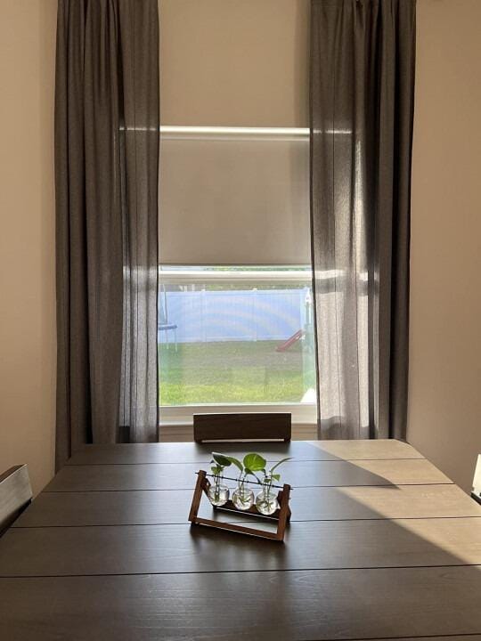 Customer photo review of Smart Motorized Roller Shades 100% Blackout Safari