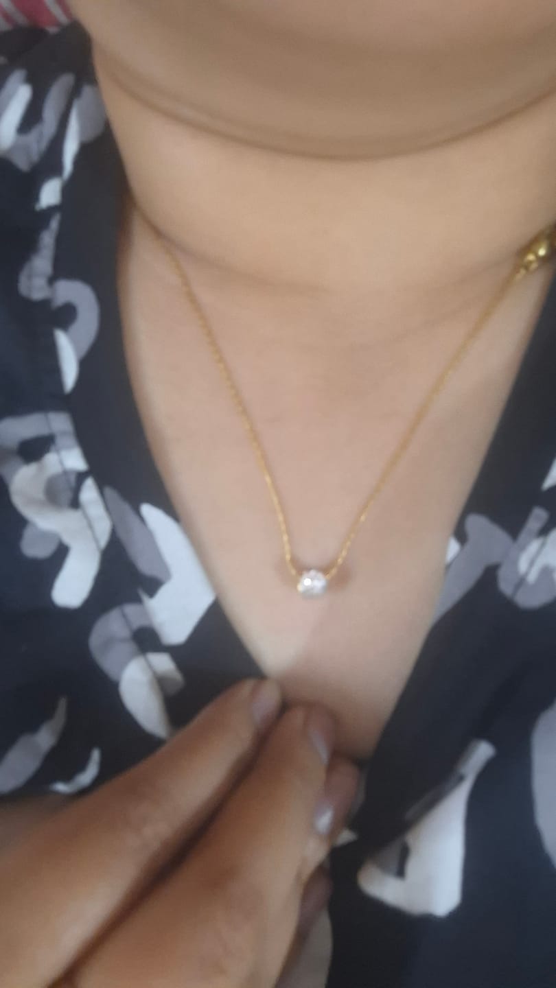 Customer photo review of Small Heart Hoop Earrings