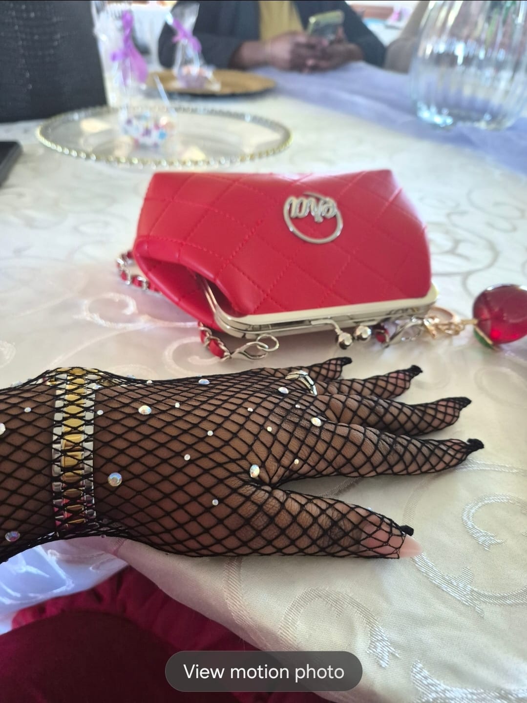 Customer photo review of ERA Mini Kisslock Chain Bag – Red