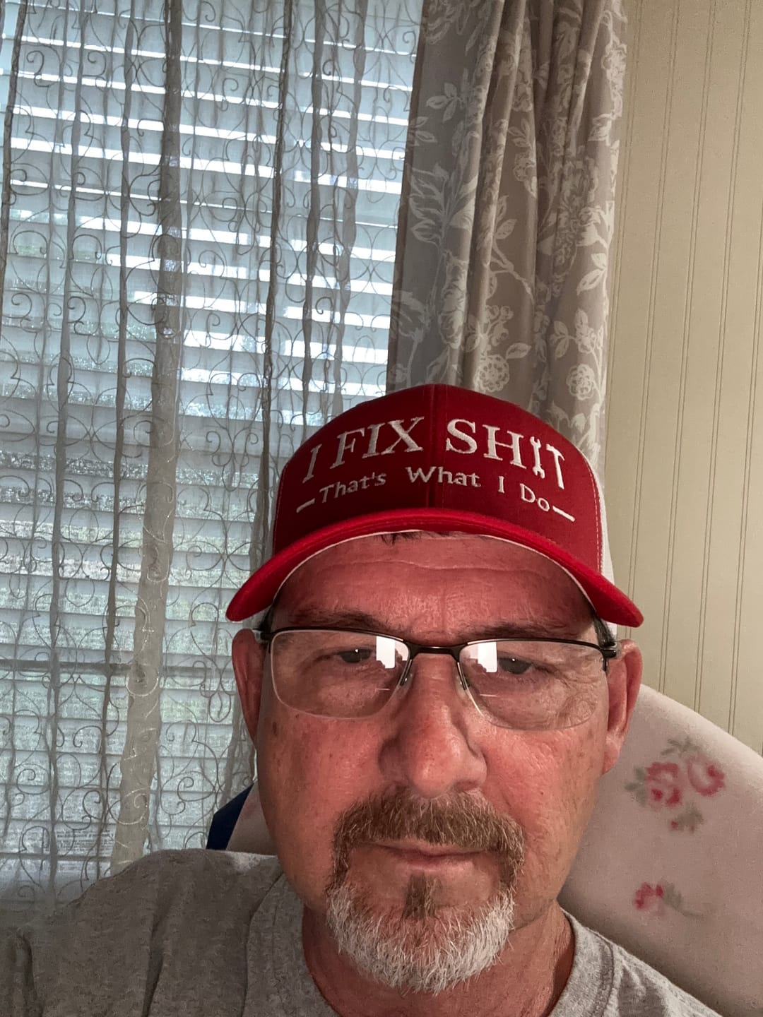 Customer photo review of Blue Collar I Fix Shit Embroidered Hat