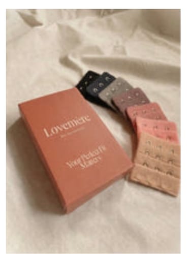 Customer's Lovemère Bra Extenders Pack showing several colorful extenders fanned out next to the packaging.