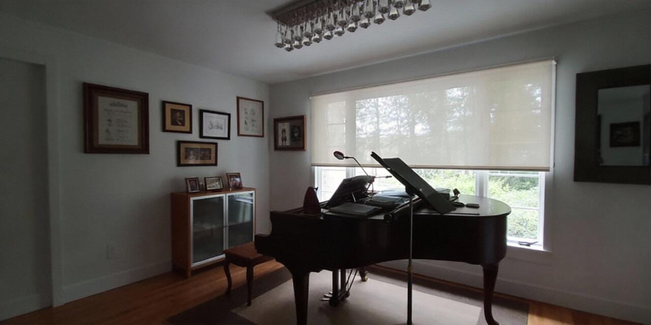 Customer photo review of Smart Motorized Light Filtering Roller Shades 70% Blackout Linen Translucent